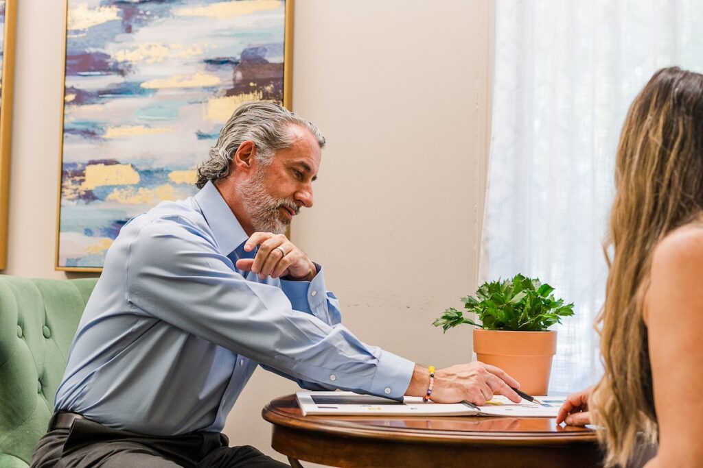 Financial Planner at Morris Financial Concepts in Charleston, SC meeting with a client.