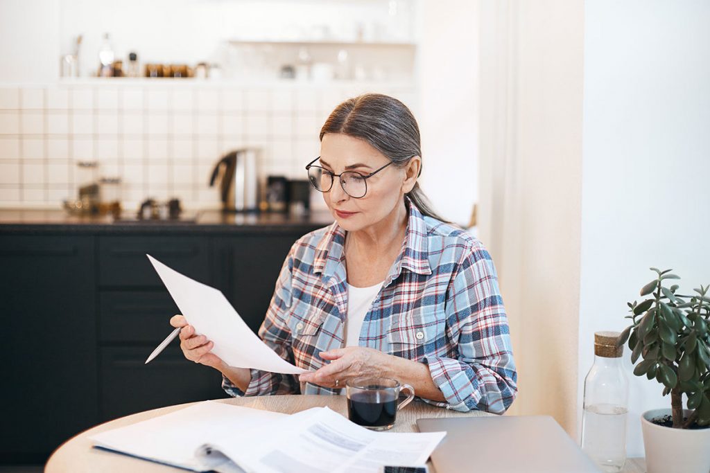 woman doing spring financial checkup