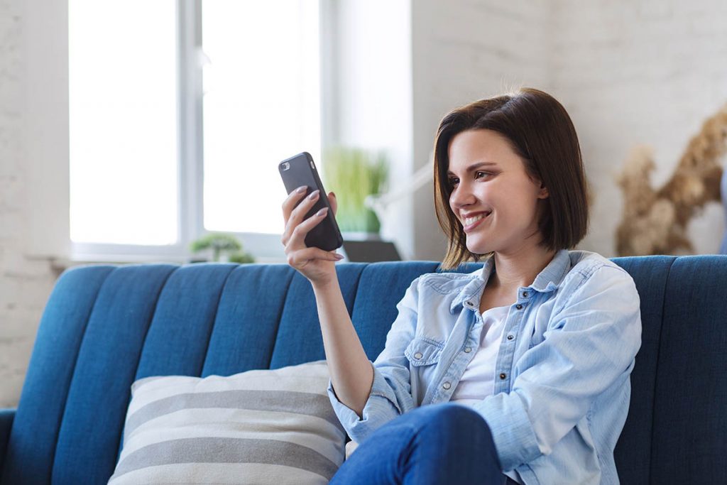 woman researching virtual travel experiences during covid-19
